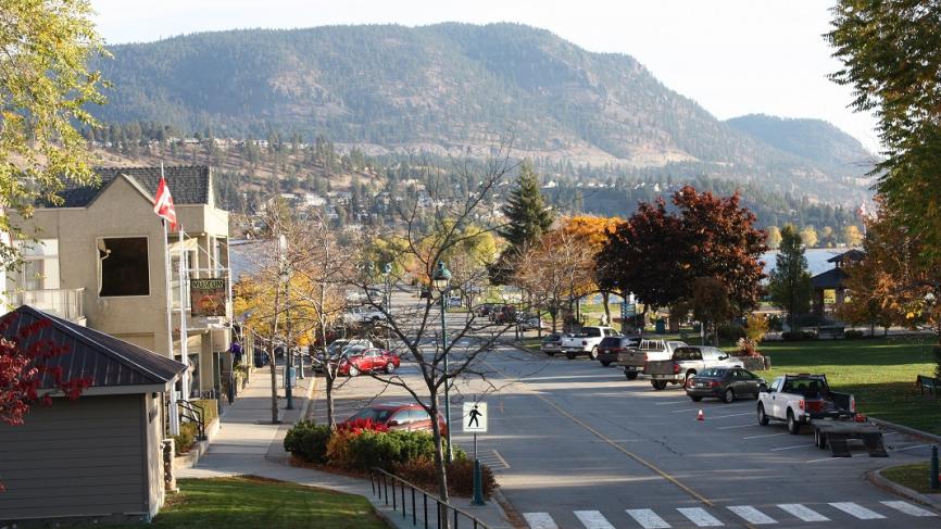 Ground view of Peachland. There are mountains in the background.