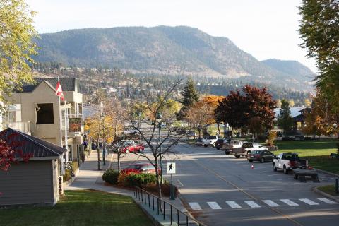 Ground view of Peachland. There are mountains in the background.